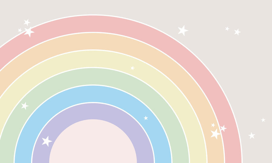Regenboog met sterren aan de hemel