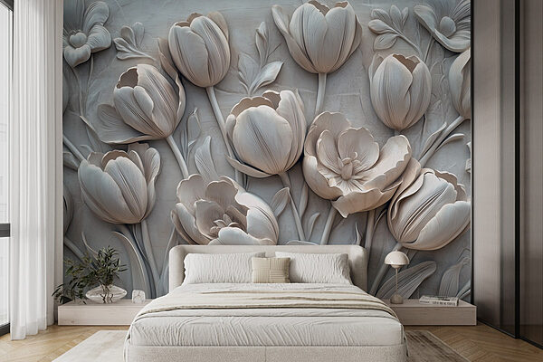 Snijwerk van witte bloemen op een muur Snijwerk van witte bloemen op een muur