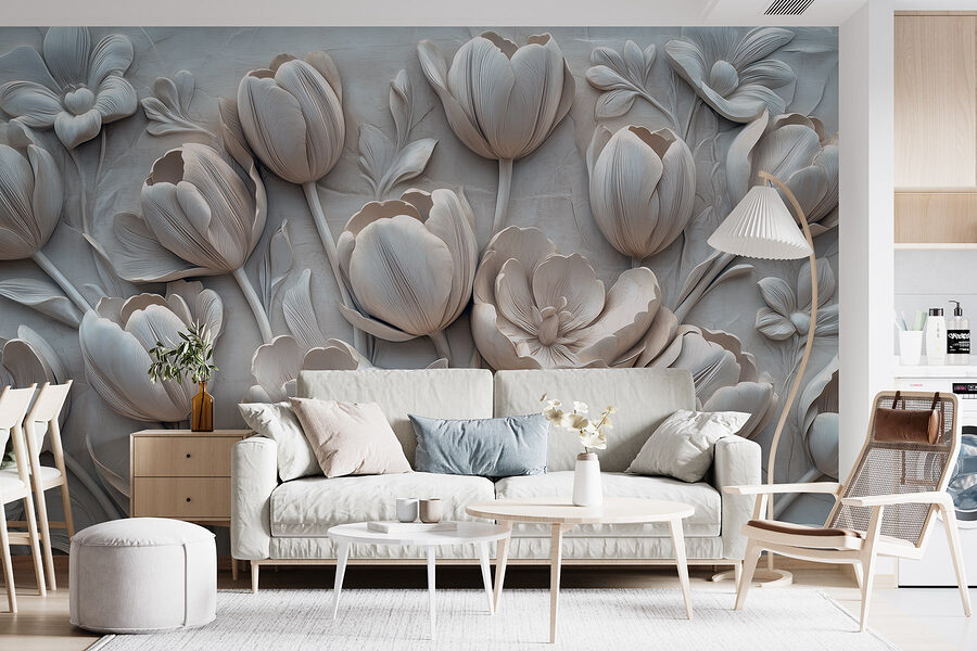 Snijwerk van witte bloemen op een muur