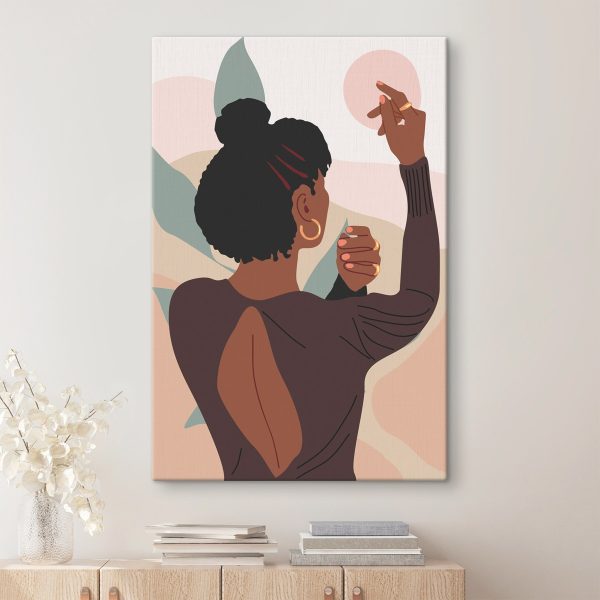 Vrouw die een muur schildert Vrouw die een muur schildert