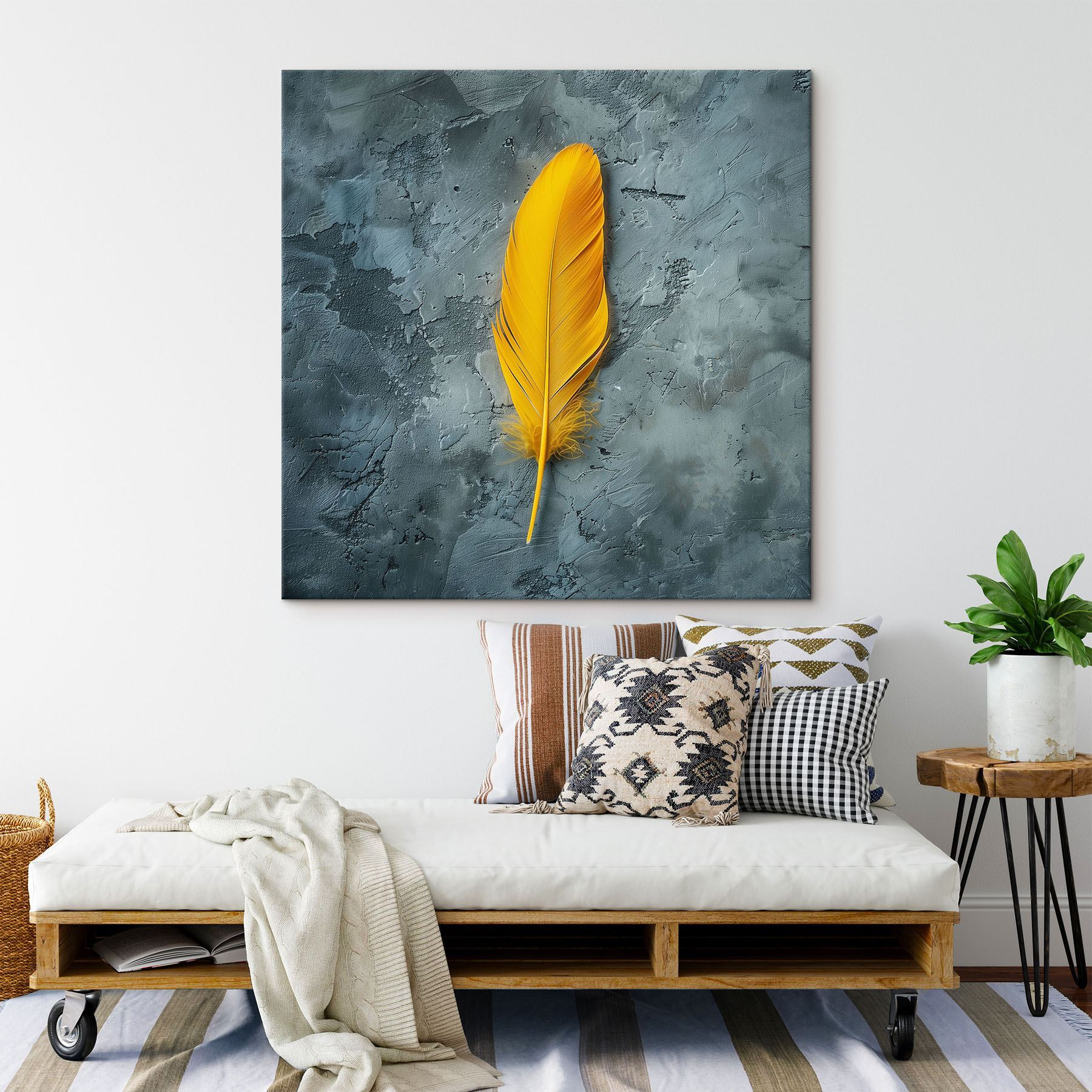 Yellow feather on a grey surface Yellow feather on a grey surface