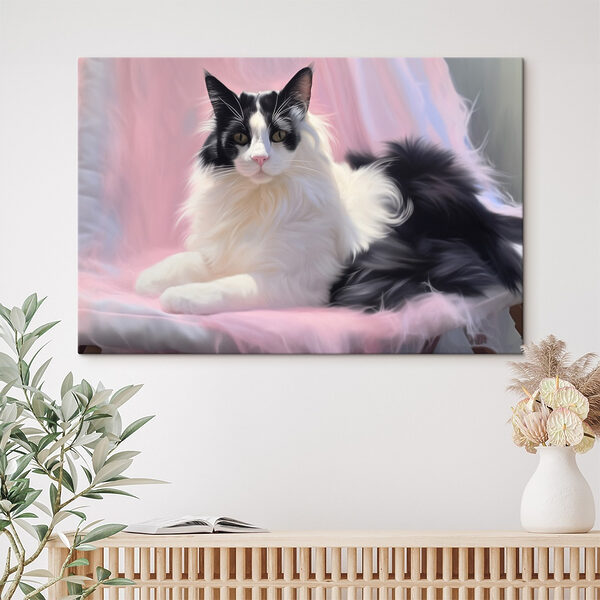 Zwart-witte kat liggend op een roze deken Canvas Schilderijen Zwart-witte kat liggend op een roze deken