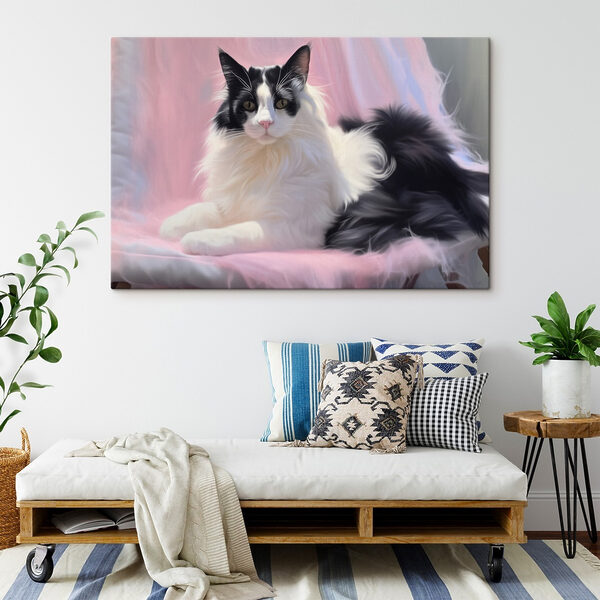Black and white cat lying on a pink blanket Black and white cat lying on a pink blanket