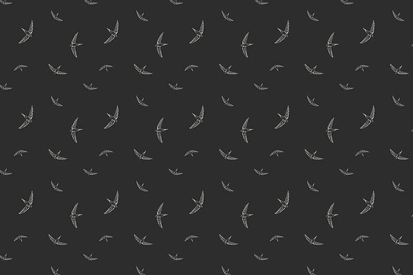 Patroon van witte vogels op een zwarte achtergrond Patroon van witte vogels op een zwarte achtergrond