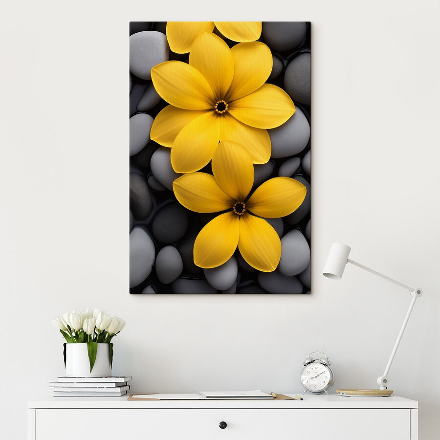 Gele bloemen op een stapel rotsen