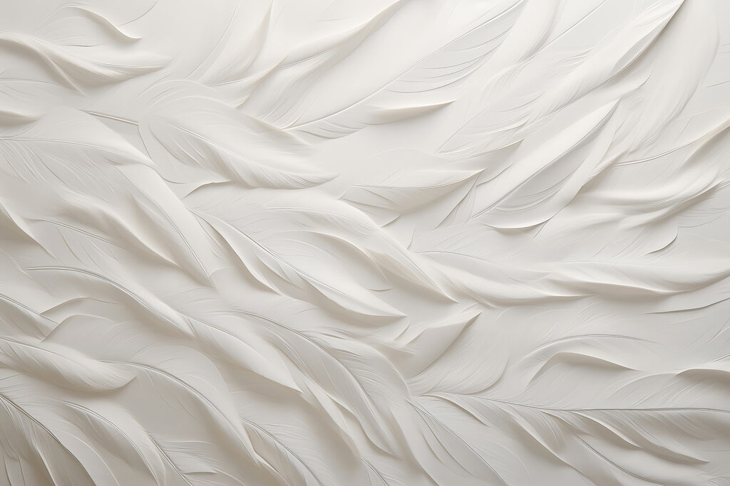 White feather pattern on a white surface