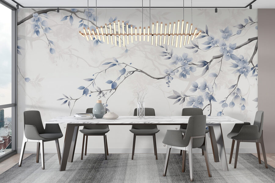 Tak met blauwe bloemen en bladeren
