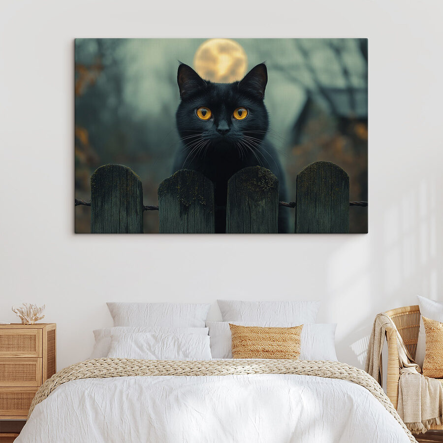 Canvas Schilderijen Zwarte kat met gele ogen achter een hek
