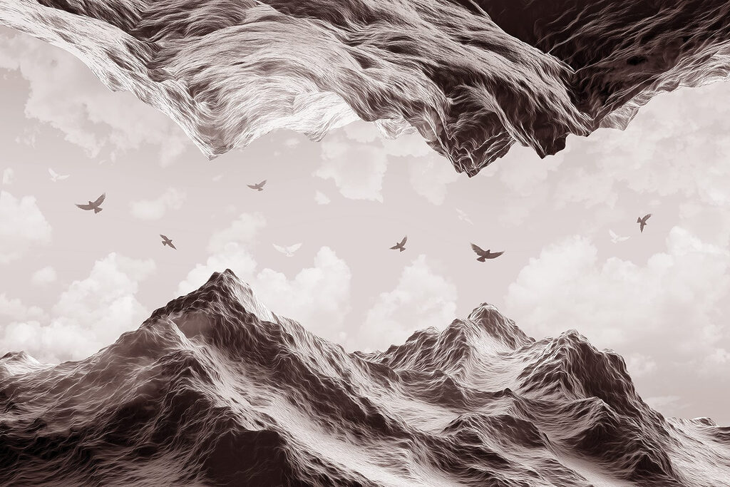 Birds flying over a mountain