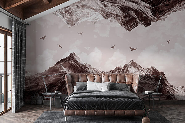 Birds flying over a mountain