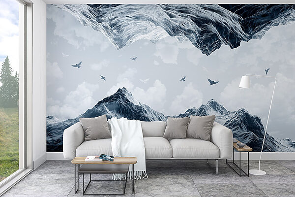 Birds flying over a snowy mountain