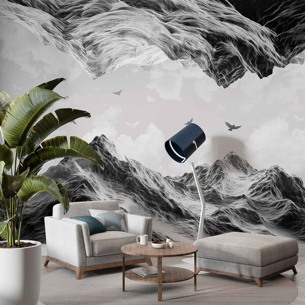 Group of birds flying over a mountain