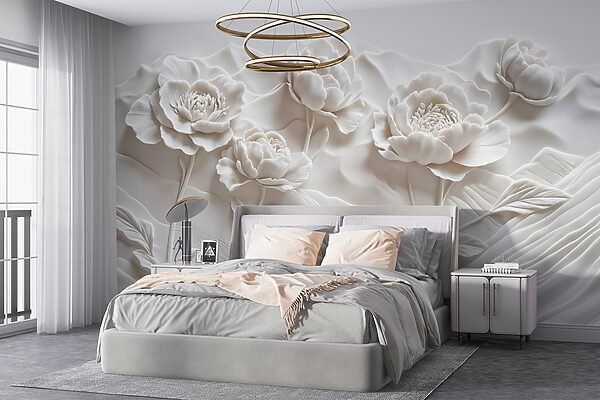 Snijwerk van witte bloemen op een muur Snijwerk van witte bloemen op een muur