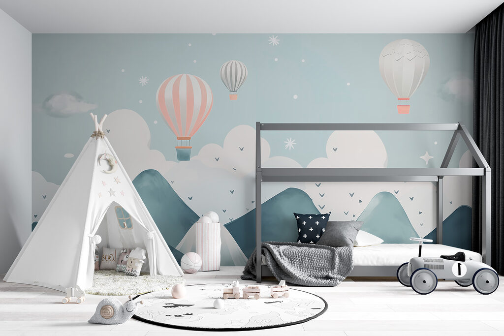 Hot air balloons flying over mountains