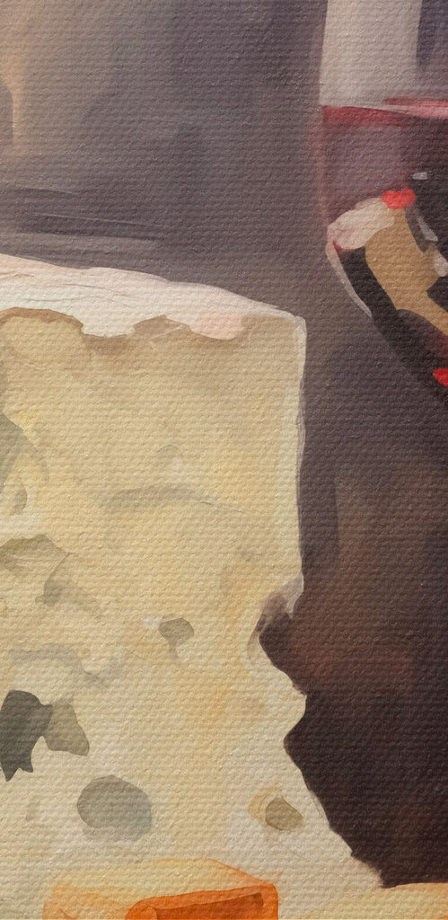 Glass of wine and cheese on a table Glass of wine and cheese on a table