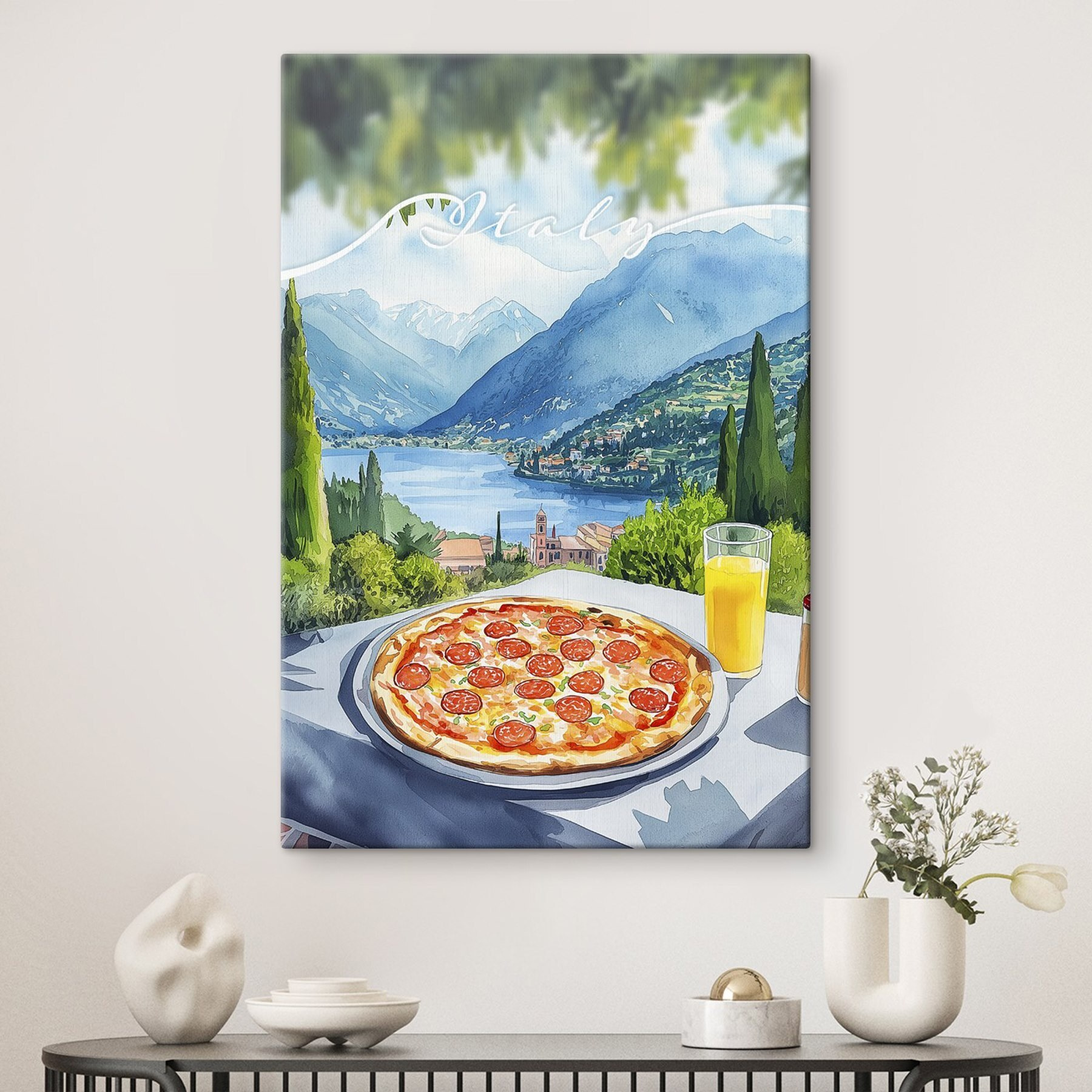 Pizza and juice on a table with mountains and trees