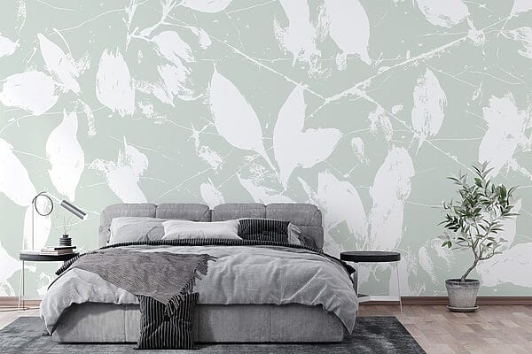 Witte bladeren op een lichtgroene achtergrond Witte bladeren op een lichtgroene achtergrond