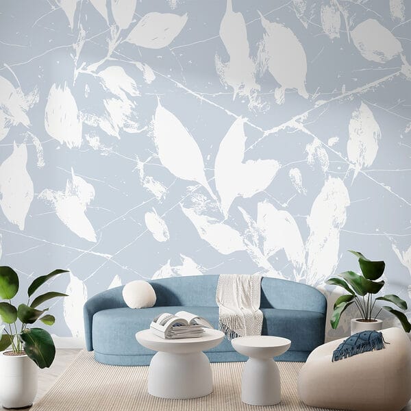 Witte bladeren op een blauwe achtergrond Witte bladeren op een blauwe achtergrond