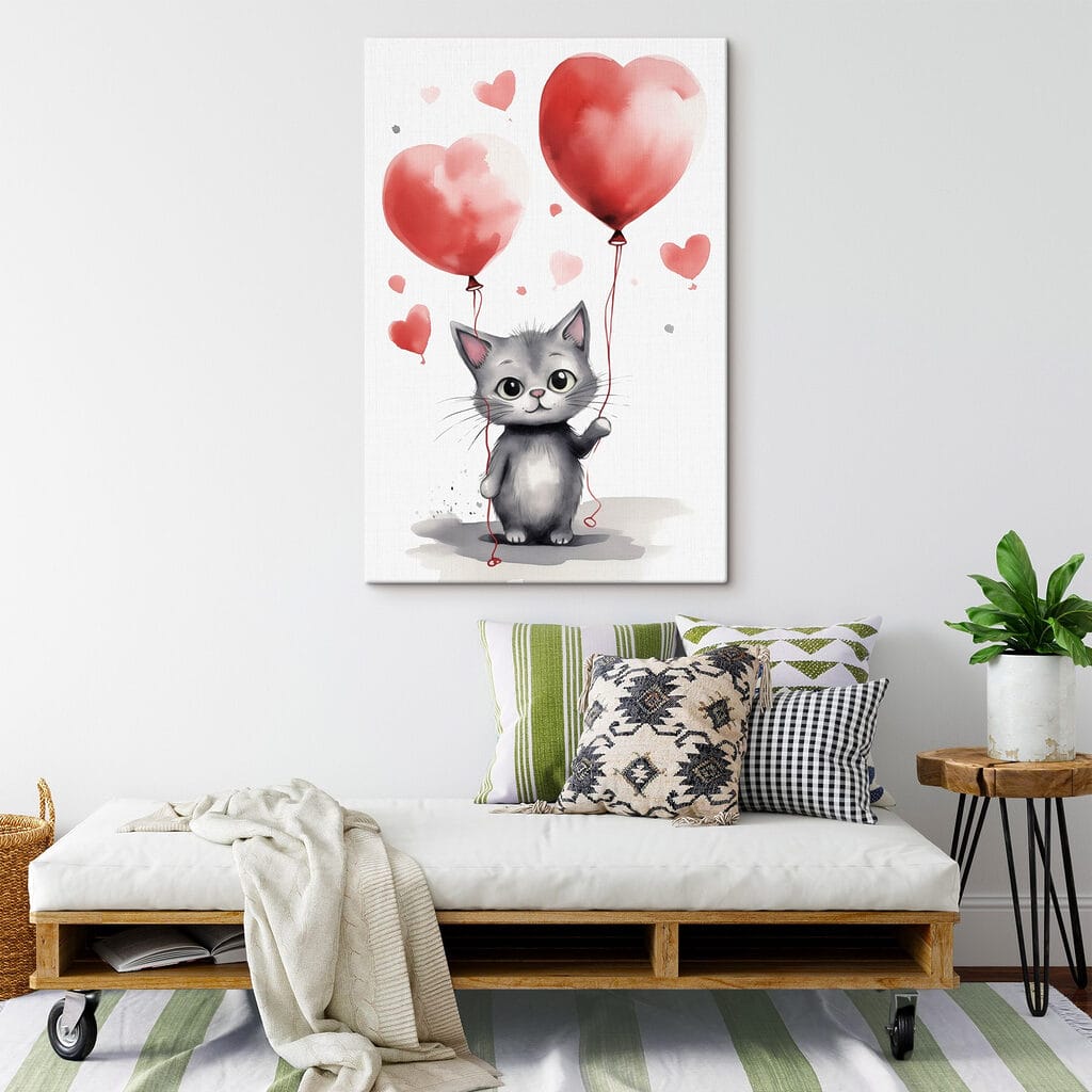 Cat holding balloons