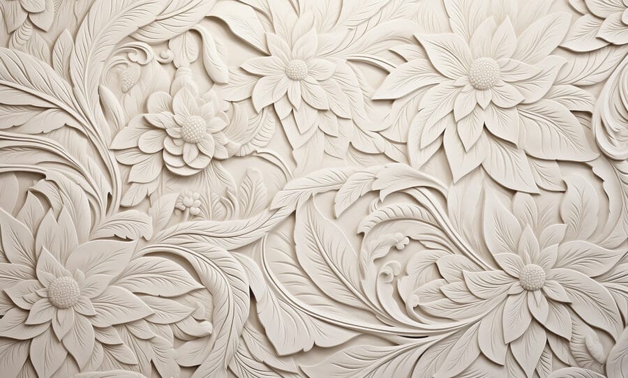 Witte muur met bloemen en bladeren