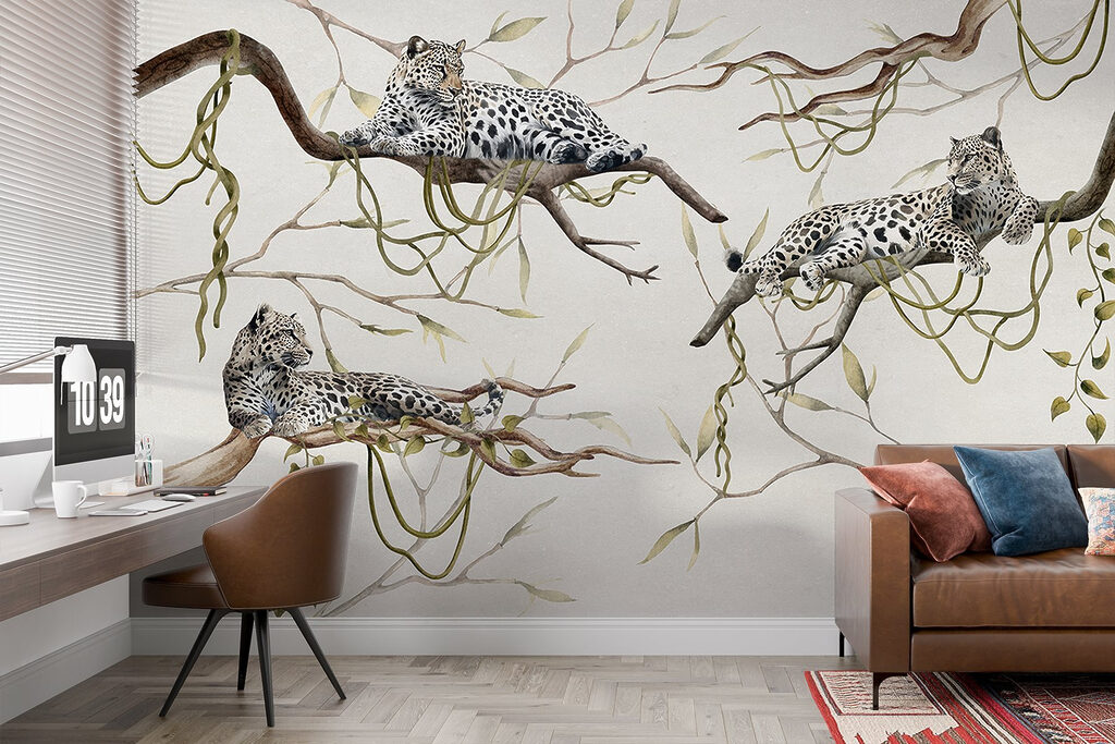 Group of leopards lying on branches