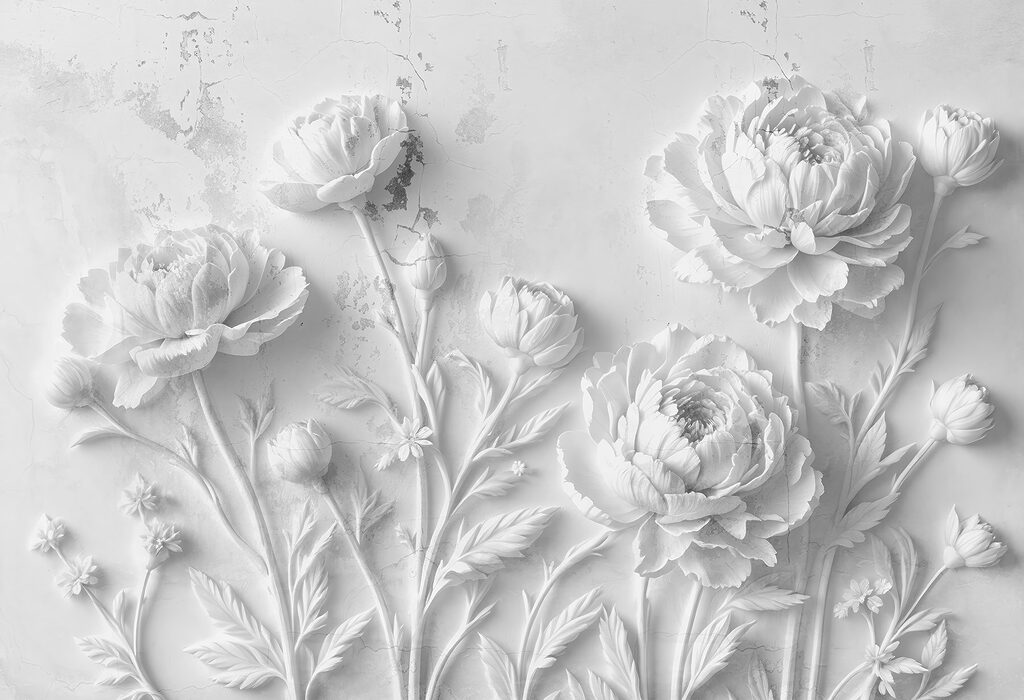 Snijwerk van witte bloemen op een muur Snijwerk van witte bloemen op een muur