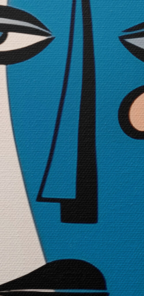 Group of faces painted on a wall