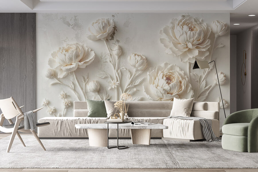 Snijwerk van witte bloemen op een muur