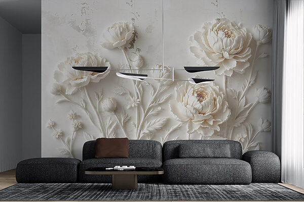 Snijwerk van witte bloemen op een muur Snijwerk van witte bloemen op een muur