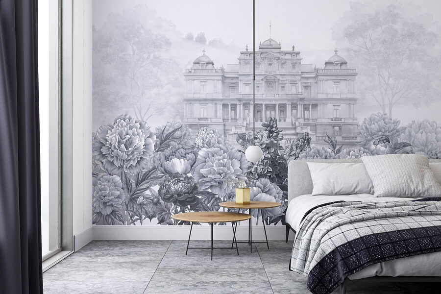 Groot wit gebouw met bloemen