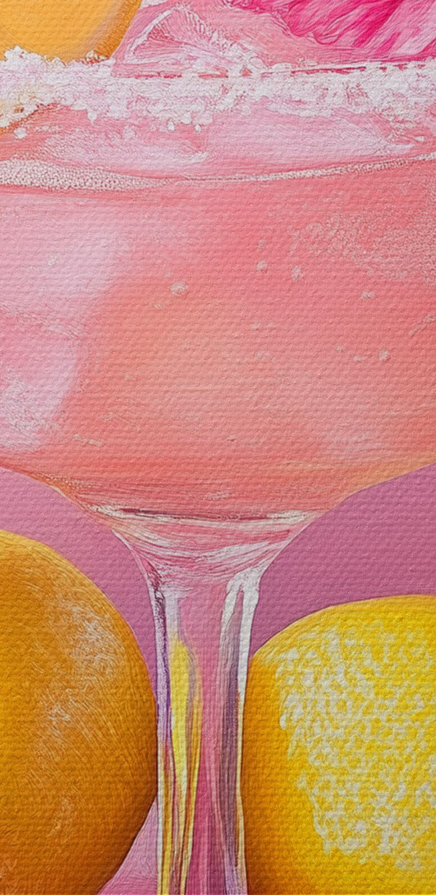 Glas met roze drank en citroenen
