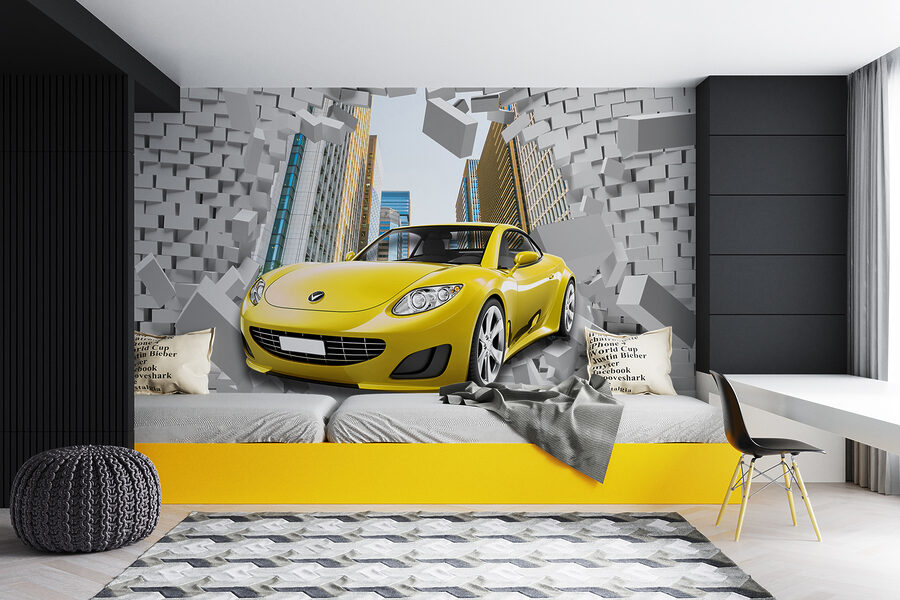 Gele auto in een muur van bakstenen