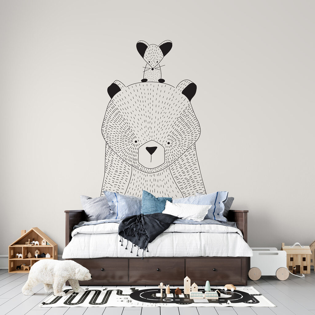 A bear with a mouse on its back A bear with a mouse on its back