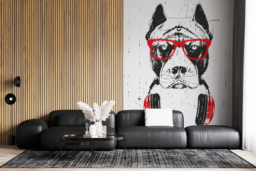 Een hond met bril en koptelefoon