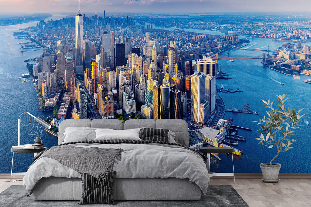 A city with many tall buildings and a body of water