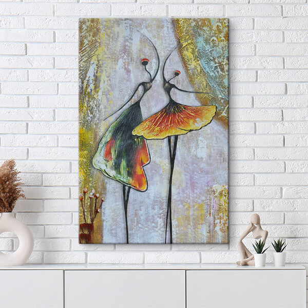 Een schilderij van twee dansende vrouwen Een schilderij van twee dansende vrouwen