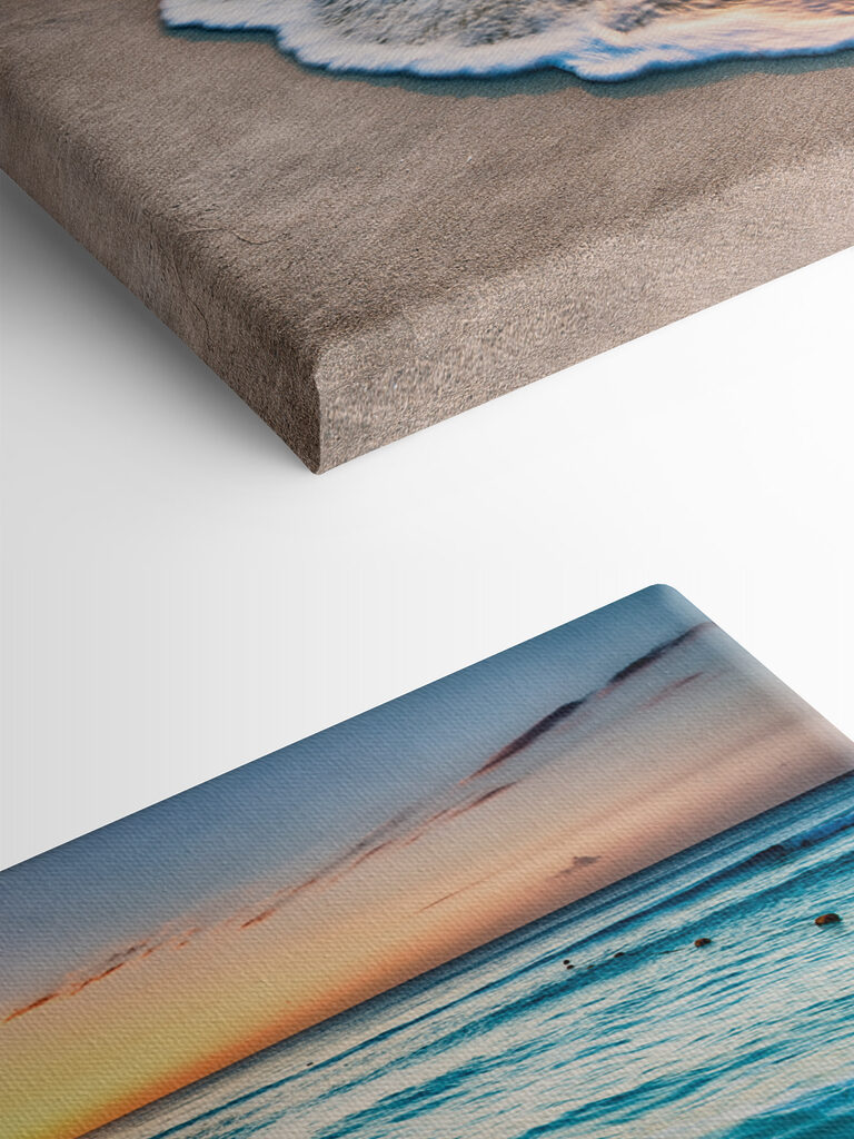 A beach with waves and a sunset