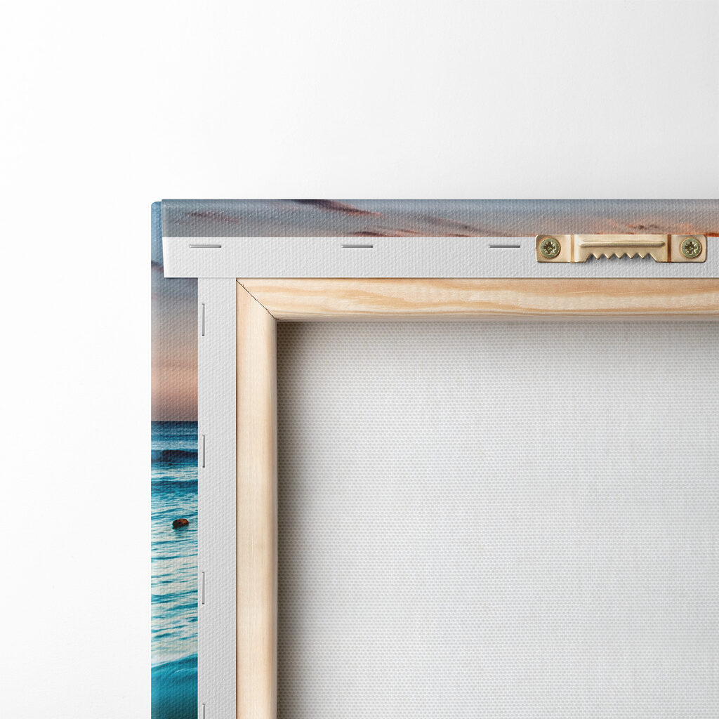 A beach with waves and a sunset