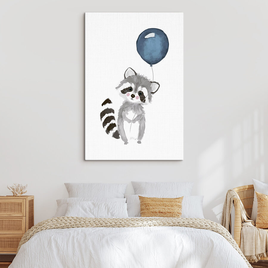 Een wasbeer met een ballon