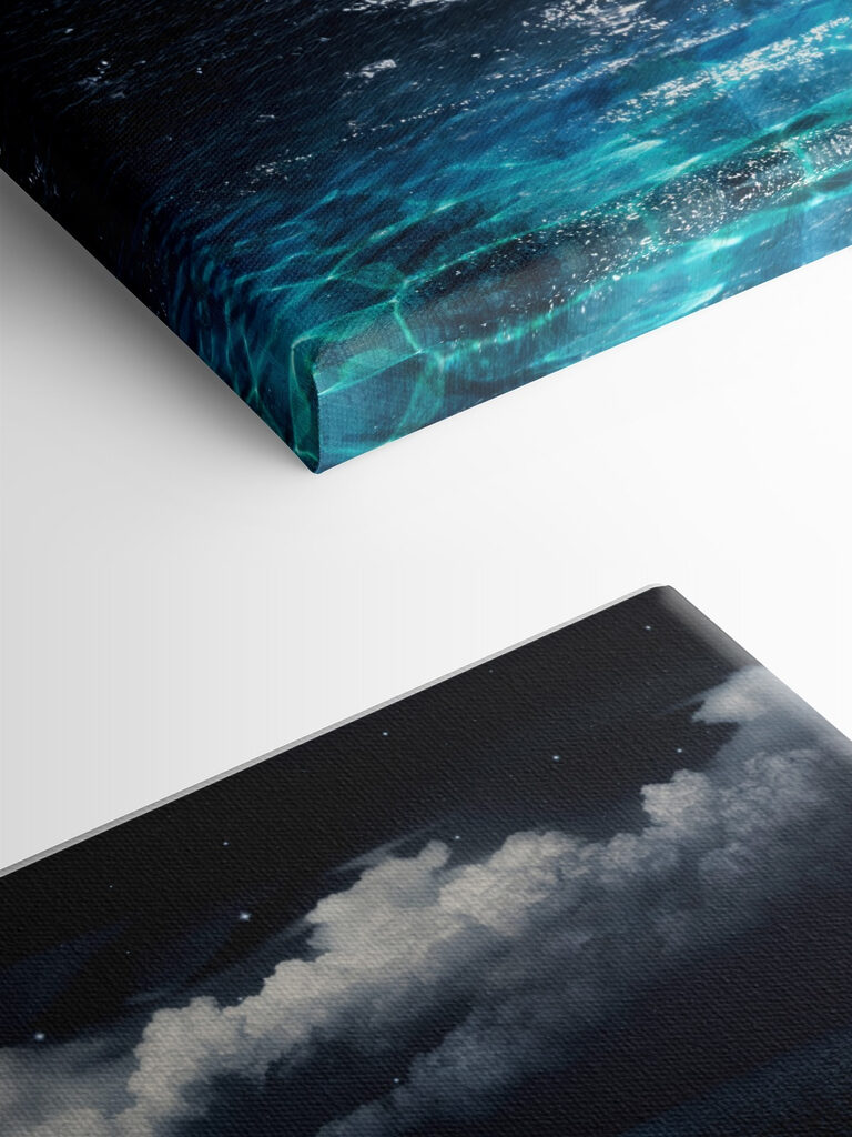 A moon over water at night