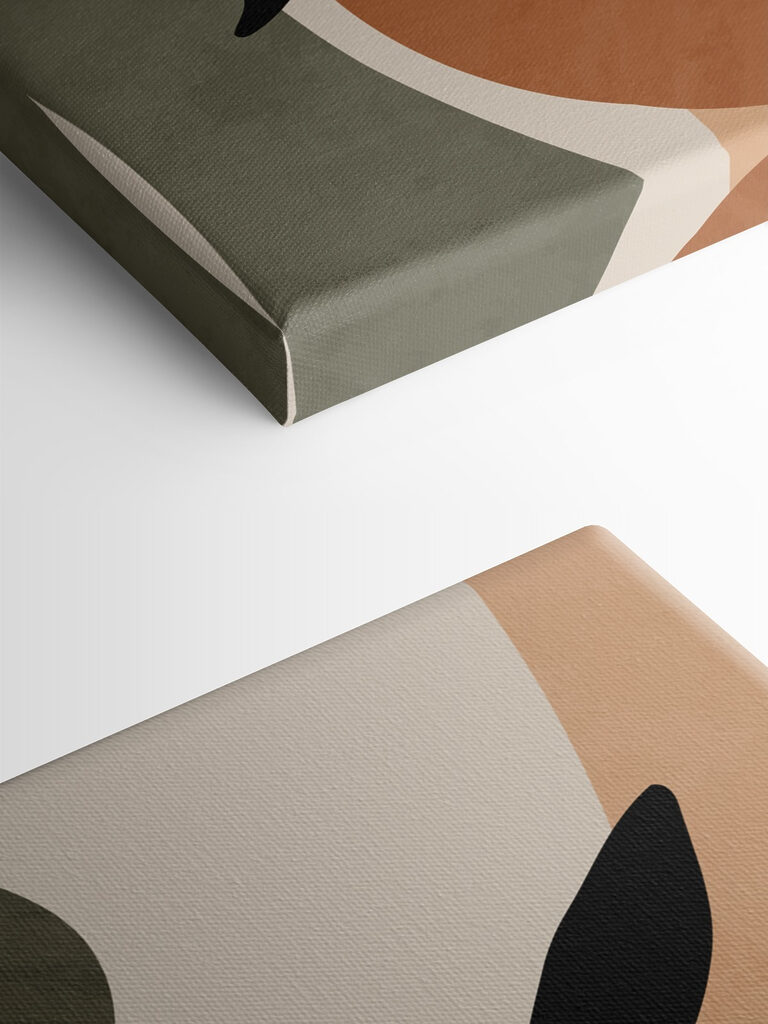 A black leaf on a branch with circles and circles