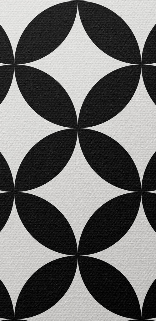 A black and white cover with a pattern of circles