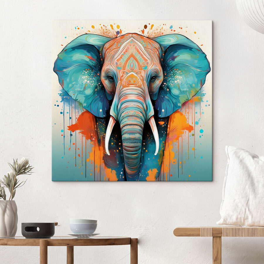 Een olifant met kleurrijke verfspatten