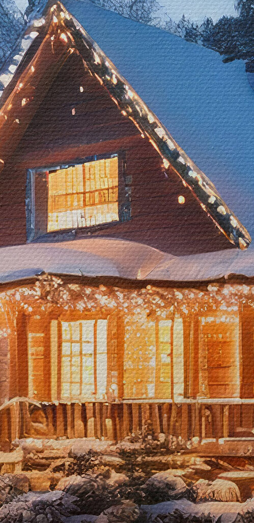 House with lights on it in the snow