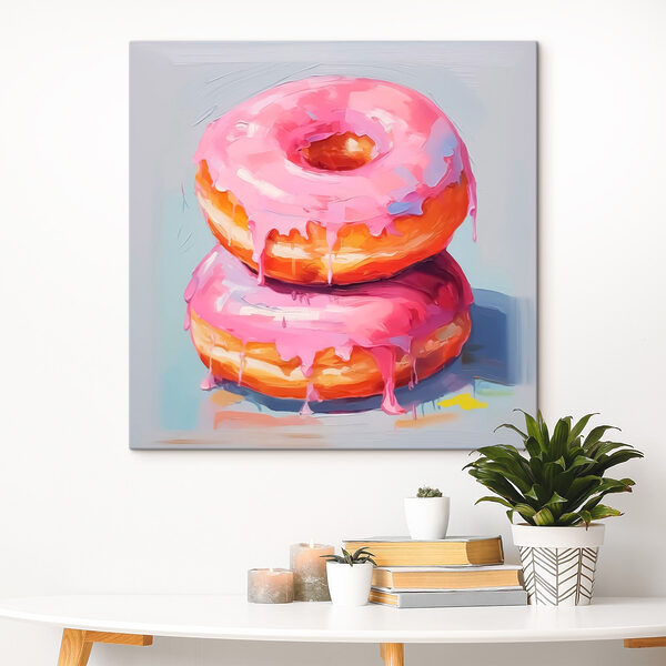 Twee donuts met roze glazuur Twee donuts met roze glazuur