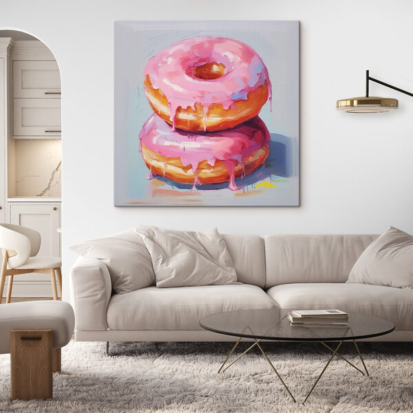 Twee donuts met roze glazuur Twee donuts met roze glazuur