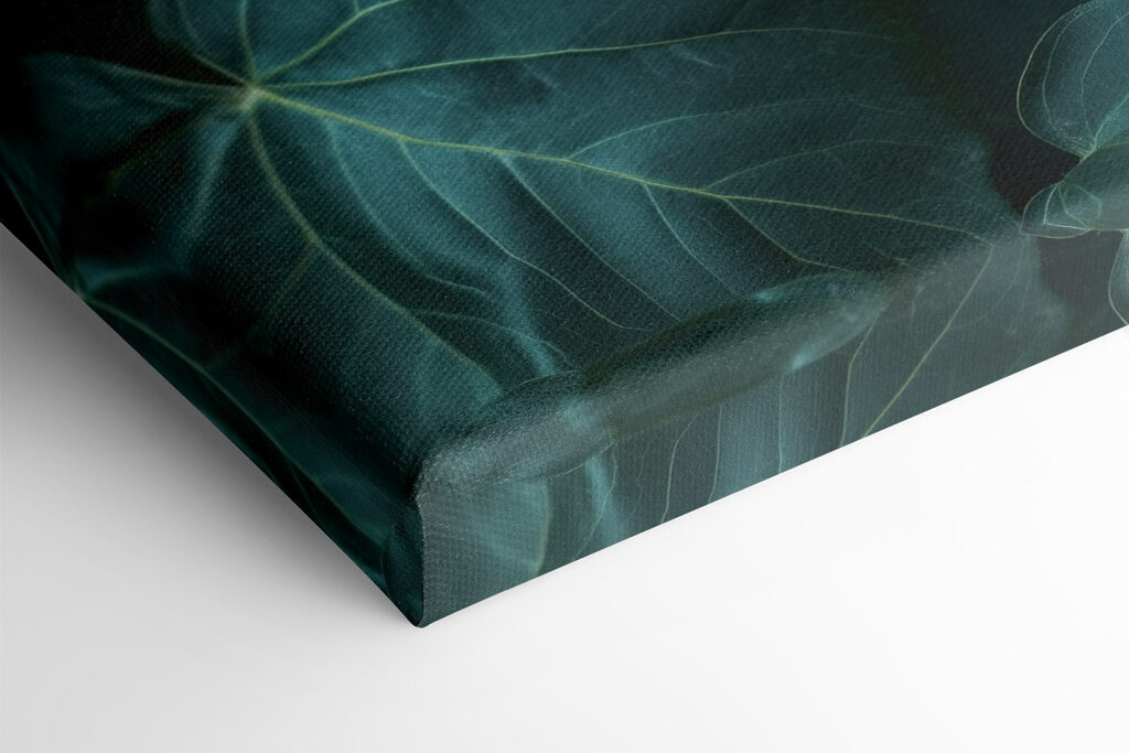 Statue of a person's face surrounded by leaves