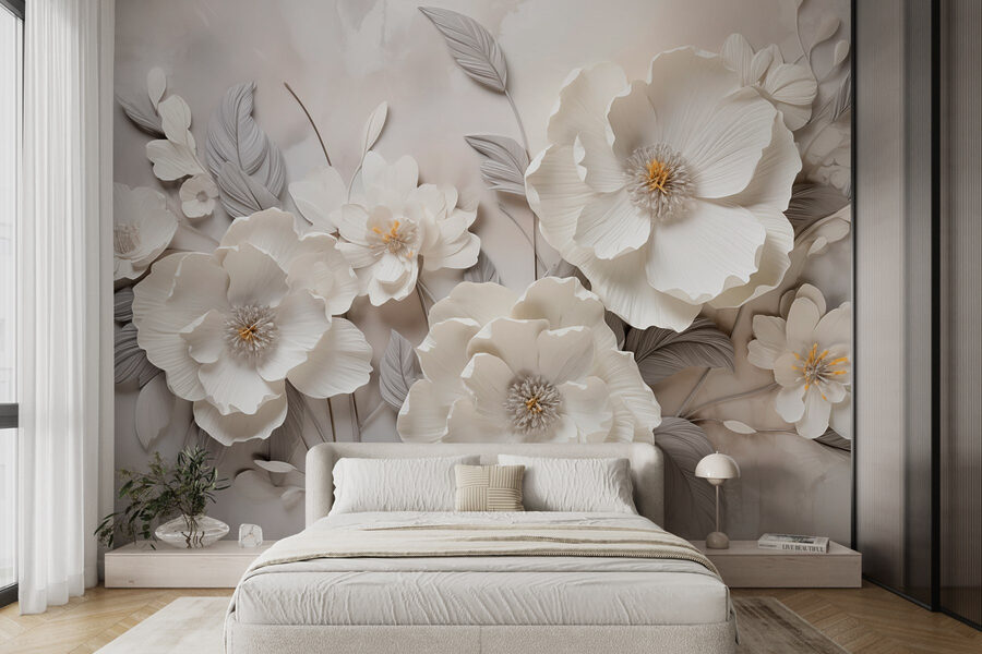 Witte bloemen op een muur