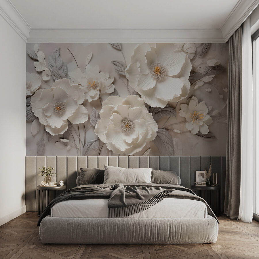 Witte bloemen op een muur