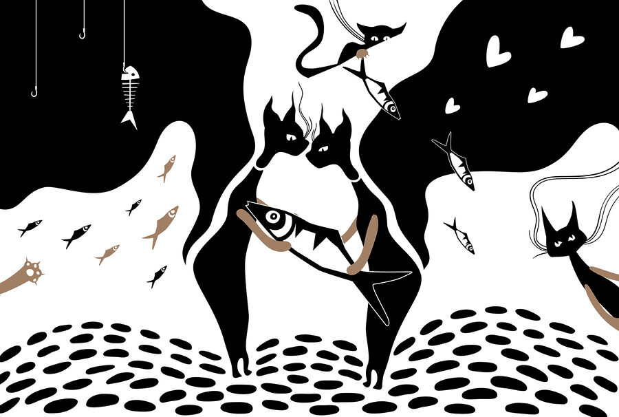 Zwart-witte kat met vis en vis